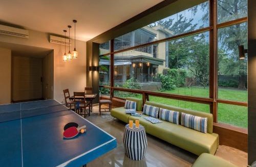 St.Stanislaus Villa Villa | SaffronStays Odeon - 4BR heritage art deco villa with cantilever pool, verandahs & forested lawns