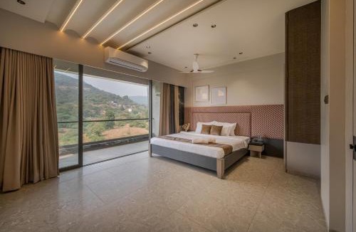 Kadadhe Villa | SaffronStays Prisma Riverfront - 8BR pool villa with game zone, garden & lake views ideal for large families near Pawna Dam