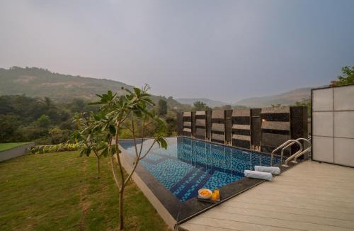 Kadadhe Villa | SaffronStays Prisma Riverfront - 8BR pool villa with game zone, garden & lake views ideal for large families near Pawna Dam