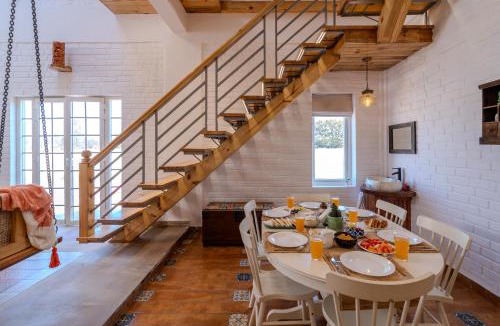 Bail Parao Villa | SaffronStays Sher Bagh - 4BR eco-friendly pool villa with jungle trails, farm-to-table meals & bonfire nights near Corbett Park