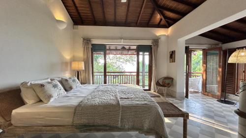 Redi Villa | SaffronStays Stella Maris Beach House - 5BR pet-friendly beachfront estate with yoga pavilion, luxury tents & private Redi Beach access