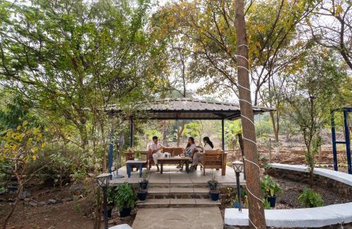 Uddar Villa | SaffronStays Terra Soul - 3BR eco-luxury pet-friendly pool villa with gazebos, bar & fish pond near Imagica & Pali Temple