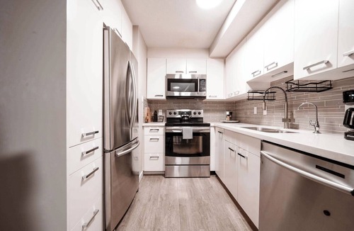 Bridgeland Apartment | Sage on the Bow - Central Condo Family Pets