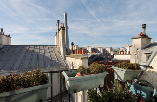 Quartier de la Monnaie Apartment | Saint Germain des Prés - Roof Tops - Eiffel Tower - Louvre - Notre Dame views