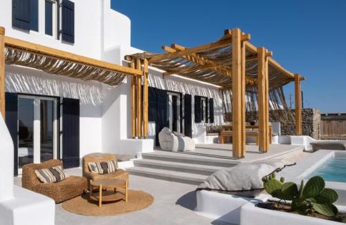 Psarou Villa | Saint L Heated Pool Sunset Villa- Three Bedrooms