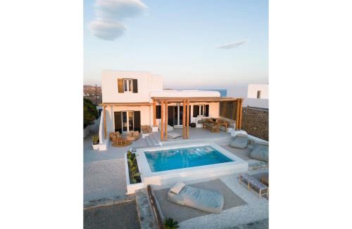 Psarou Villa | Saint L Heated Pool Sunset Villa- Three Bedrooms