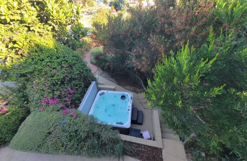 North Park Villa | San Diego's 4-bed Oasis with Hot Tub, Gym, Outdoor Theater & Huge Yard.