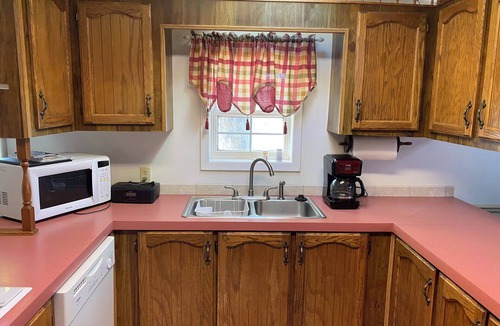 Oscoda House | Sandy beach directly on Lake Huron. Kayaks, hammocks, fire pit, and more!