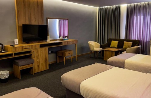 Jabal Al-Hussein Hotel | Sandy Palace Hotel Amman