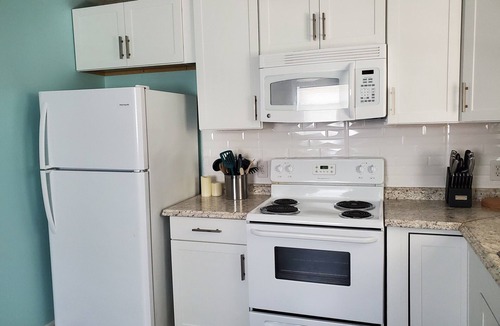 Tranquil Harbour House | Sandy Paws - A Dog-Friendly Haven with Boat Parking on Oak Island, NC