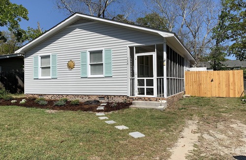 Tranquil Harbour House | Sandy Paws - A Dog-Friendly Haven with Boat Parking on Oak Island, NC