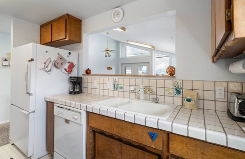 Ferndale House | Sandy Point Sanctuary: 2BR Home w/Stunning Ocean Views, Cozy Fireplace & Deck