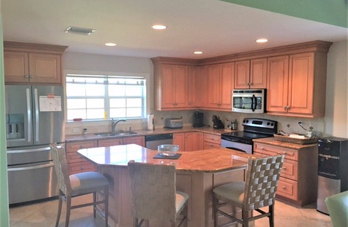 Beachview Country Club Estates House | Sanibel tranquility - 4 bedroom, 3 bathroom, heated pool, minutes walk to beach