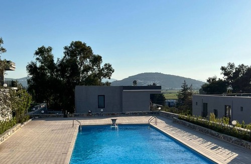 Milas Apartment | Scenic Flat with Shared Pool in Milas