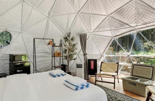 Lincoln House | Scenic Mountain View Dome Retreat with Cozy Wood Stove in Lincoln, Maine