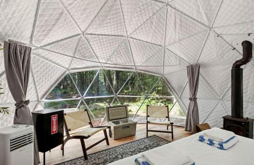 Lincoln House | Scenic Mountain View Dome Retreat with Cozy Wood Stove in Lincoln, Maine