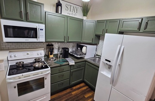 Decatur Apartment | Scenic Serene Spacious Studio 65in Smart TV WiFi Sun Ticket Laundry Full Kitchen