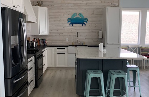 Rockport House | Sea Breeze Cove-waterfront-rooms with views, dock with fish