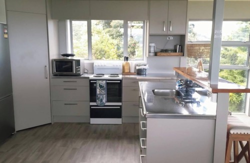 Amodeo Bay House | Sea views, rolling hills, and pure calm - King of the Hill lives up to its name.