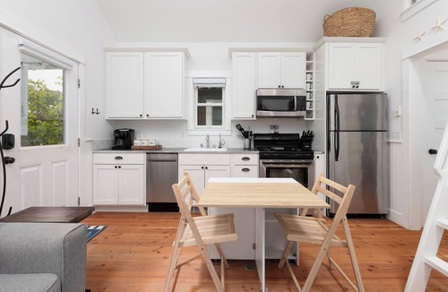 Seabrook Cabin | Seabrook 2 Bedroom cottage with hot tub, a wooded setting. Pet friendly and AC!