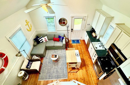 Seabrook Cabin | Seabrook 2 Bedroom cottage with hot tub, a wooded setting. Pet friendly and AC!