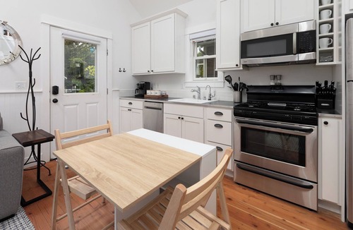 Seabrook Cabin | Seabrook 2 Bedroom cottage with hot tub, a wooded setting. Pet friendly and AC!