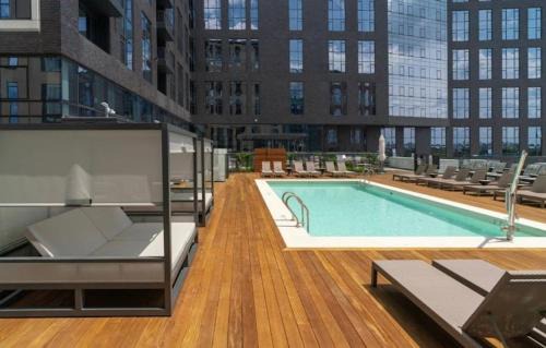 Seaport District Apartment | Seaport Apartment Fireplace Gym & Pool Access