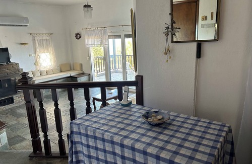 Mola Kalyva Villa | SeaStone Villa – Authentic Stone & Wood Retreat, 20m from the Sea. Chalkidiki