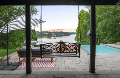Louisa House | Secluded 3 Acre 5 BR Resort with Heated Private Lakeview Saltwater Infinity Pool, Hot Tub, Boat House, Sauna, and Game Room