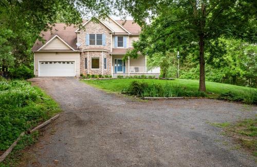 Louisa House | Secluded 3 Acre 5 BR Resort with Heated Private Lakeview Saltwater Infinity Pool, Hot Tub, Boat House, Sauna, and Game Room