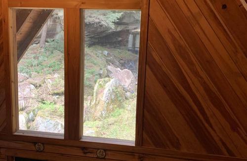 Rogers Cabin | Secluded Cabin with a private waterfall at Spirit Lake and internet