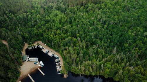 Babbitt House | Secluded Creekside Cabin with Screened Porch Near the Marina in Babbitt, Minnesota
