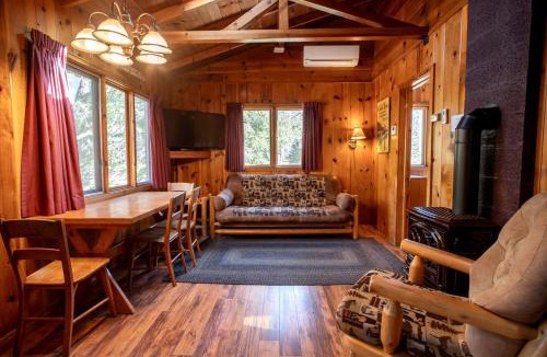 Babbitt House | Secluded Creekside Cabin with Screened Porch Near the Marina in Babbitt, Minnesota