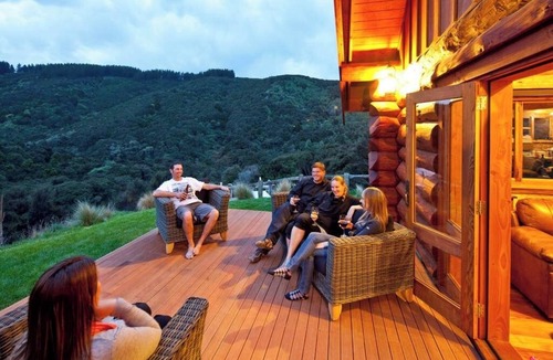 Clutha District House | Secluded Eco-friendly Log Cabin with Steaming Outdoor Baths