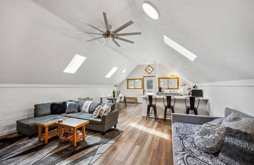 Burt Lake Cottage | Secluded hideaway in the woods! Renovated, well appointed 1928 cottage