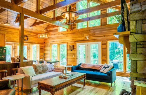 Hot Springs Cabin | Secluded Luxury Cabin with Private Waterfall, Mountain Views, Game Room, and Scenic Hiking Trails