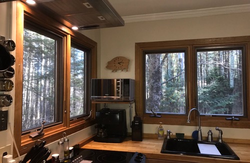 Sheffield House | Secluded Mountainside House with Outdoor Sauna, Surrounded by Trees.