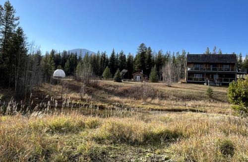 Polebridge House | Secluded Off-Grid Cabin with Glacier Park Views and Wall Tents near Polebridge, Montana