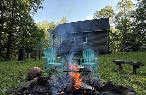 Scottown Cabin | Secluded Off-Grid Cabin with Waterfall & Hiking Trails Near Rome Township, OH