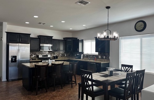 Corona de Tucson House | Secluded vibes, fireside stargazing, sparkling pool, and modern comfort.