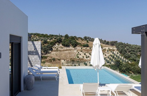 Kapsaliana Villa | Secluded villa with hot tub, heated pool & sea view!
