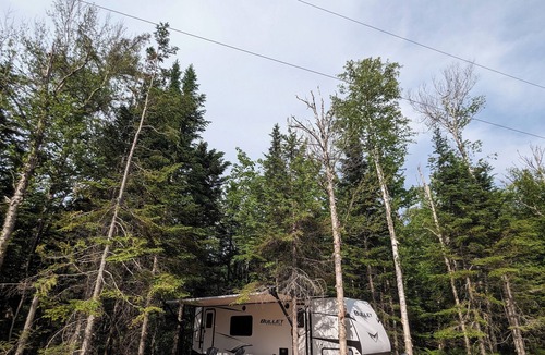 Evanston House | Secluded, well equipped 'offgrid' RV w/ outdoor space, trails. Pet friendly