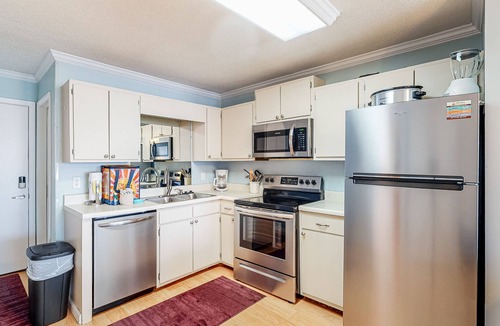 Fort Morgan Condo | Second-floor ocean view condo with WiFi, shared pools, central AC, & shared W/D