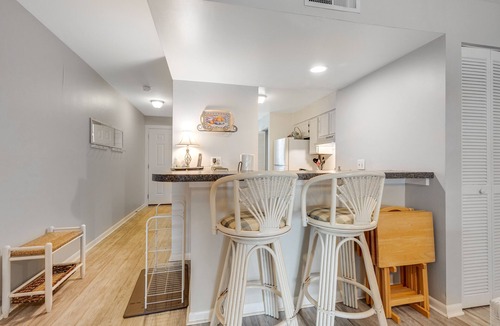 Folly Beach Villa | Second-floor villa w/river views & community pool, tennis courts, and dock