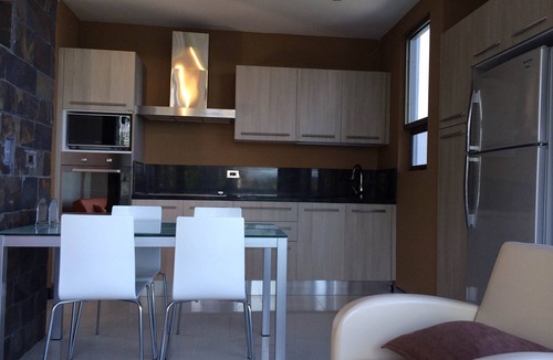 Tilaran Condo | Second Level Luxury Condo with Astonishing Lake Arenal Views