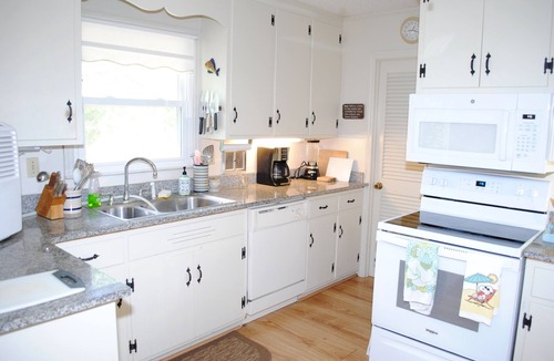 North Litchfield Beach House | Second row home nestled beneath canopy of trees located at North Litchfield Beach.
