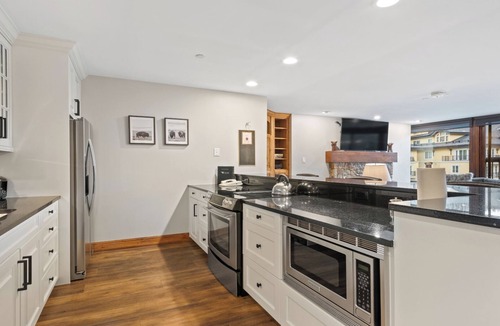 Vail Condo | Serene 3BR Stone Fireplace Gourmet Kitchen & Vail Mountain Views