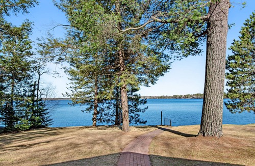 Three Lakes Cabin | Serene lakefront cabin with kayaks, fire pit, grill, WiFi, & Netflix