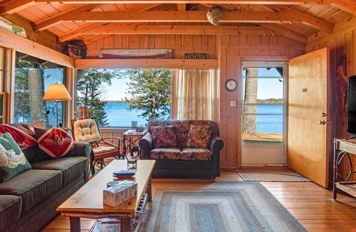 Three Lakes Cabin | Serene lakefront cabin with kayaks, fire pit, grill, WiFi, & Netflix