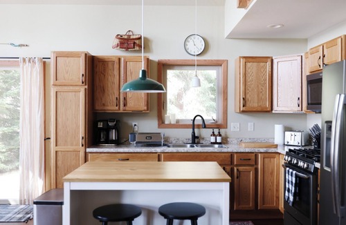 Eagle River House | Serene Lakefront Retreat: A/C, dock, canoe, kayaks